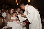Photographie de la cérémonie d'un baptême réalisée par Huitièm'art, photographe de baptême à Avignon (Vaucluse)